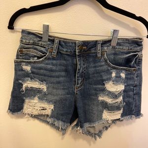 Distressed denim shorts